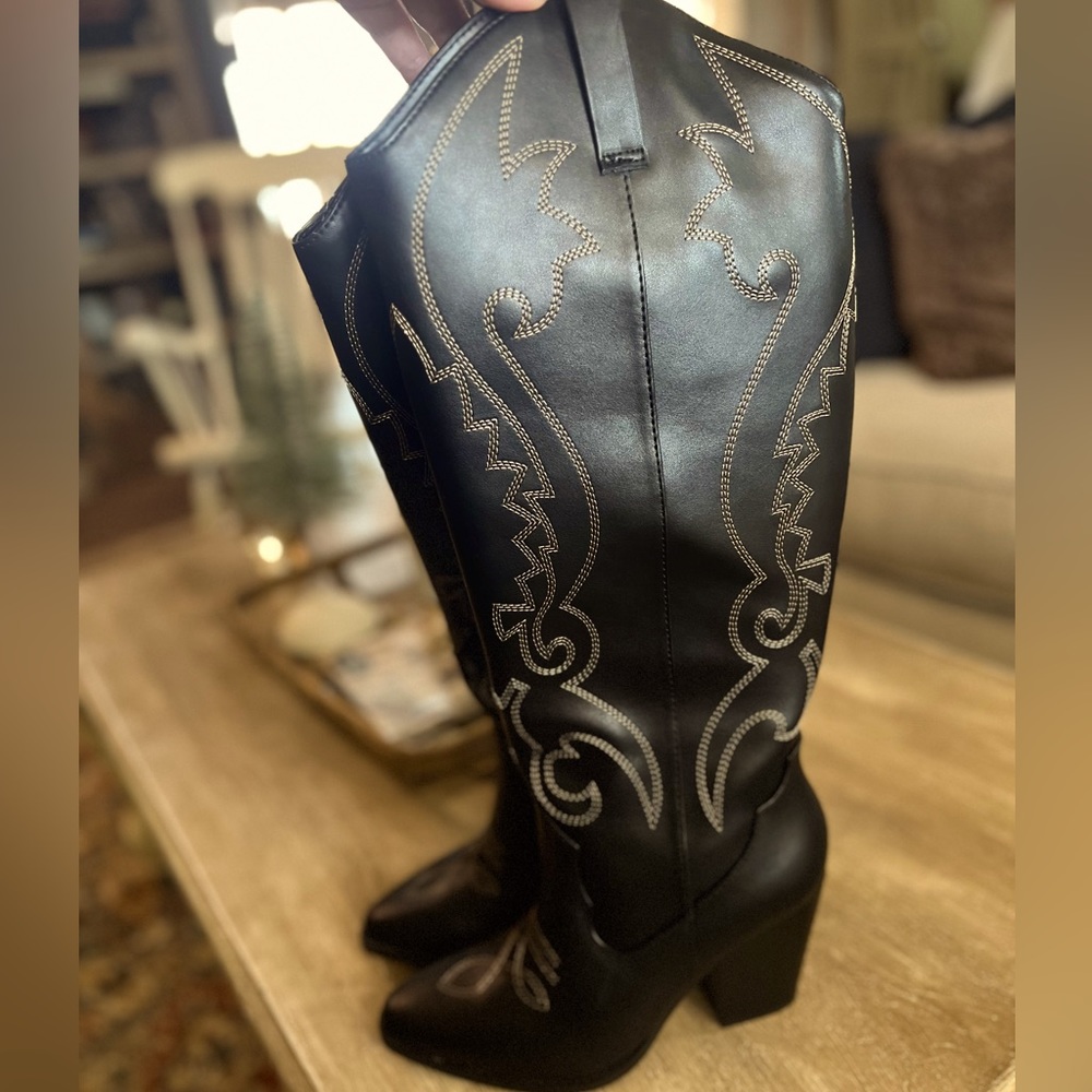 Size 8 Women’s foux leather black tall cowgirl boots with high heel.